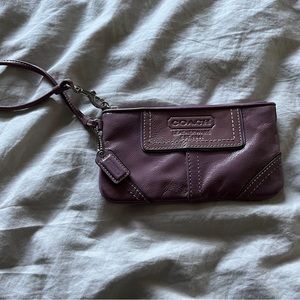 Small purple pleather coach wristlet